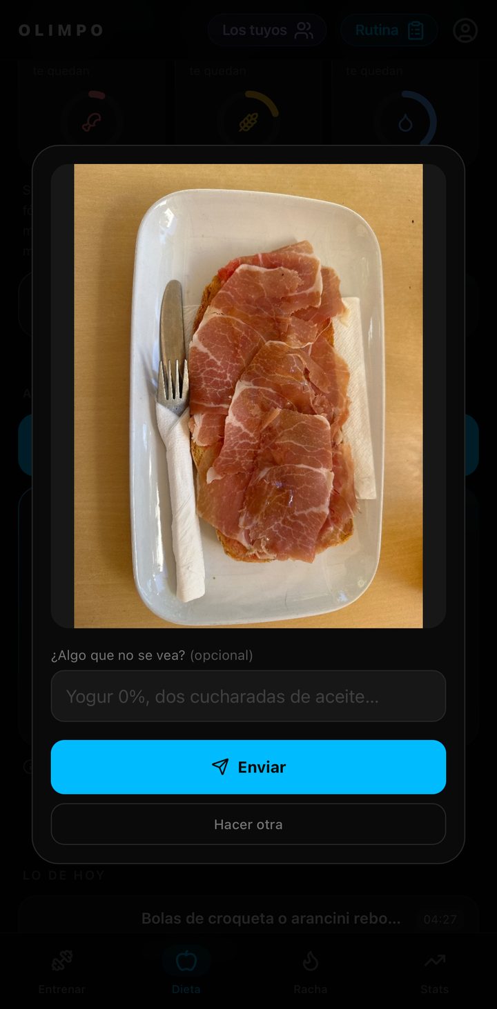 OLIMPO con la foto de una tostada con jamón a punto de enviarse, y debajo un campo para añadir lo que no se ve